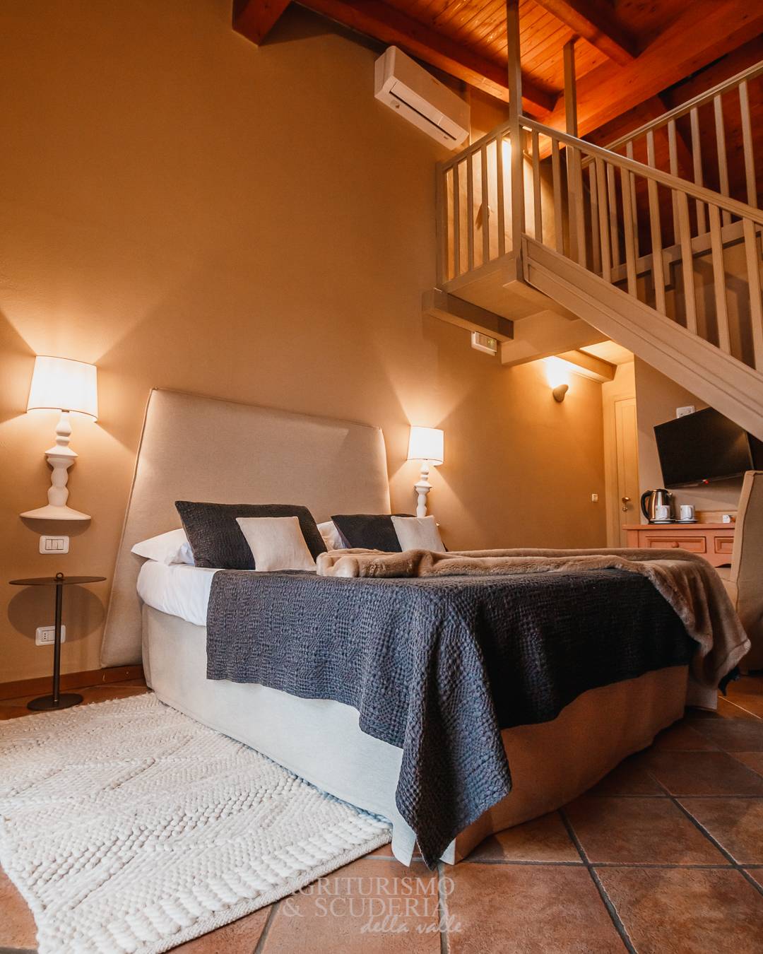Camera Quadrupla Deluxe dell'agriturismo tra le montagne della Valle Imagna